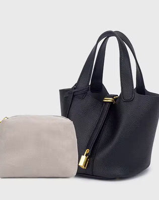 Classic Vegetable Women's Handbag by Problems Solved, simple bucket bag with smooth leather finish and spacious interior.