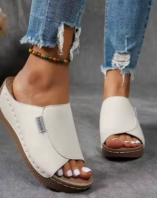 Women’s wedge slippers by Problems Solved featuring summer fashion design with comfortable slip-on style and neutral color.