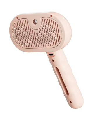 Dog steam comb pet massage brush by Problems Solved, USB rechargeable, showing the comb with steam vents and ergonomic handle.