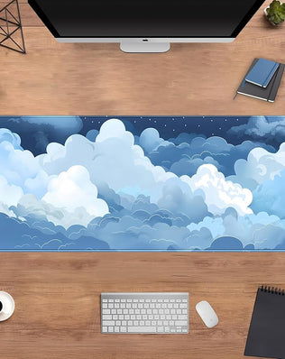 Blue and white cloud-themed desk mat by Problems Solved, featuring a soft, puffy surface ideal for gaming and workspace comfort.