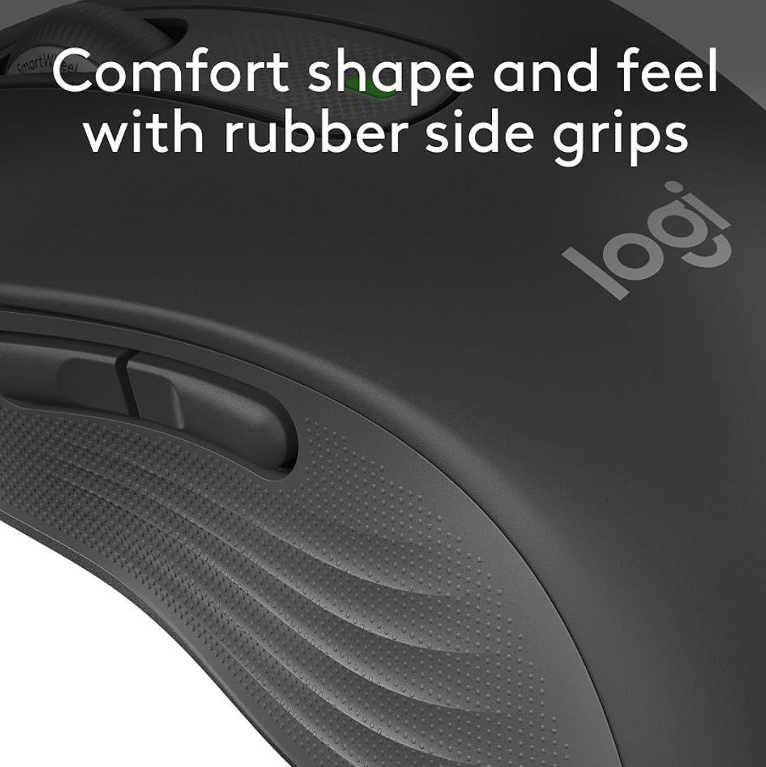 Problems Solved Signature M650 L full size wireless mouse with ergonomic design and multiple buttons on a desk.