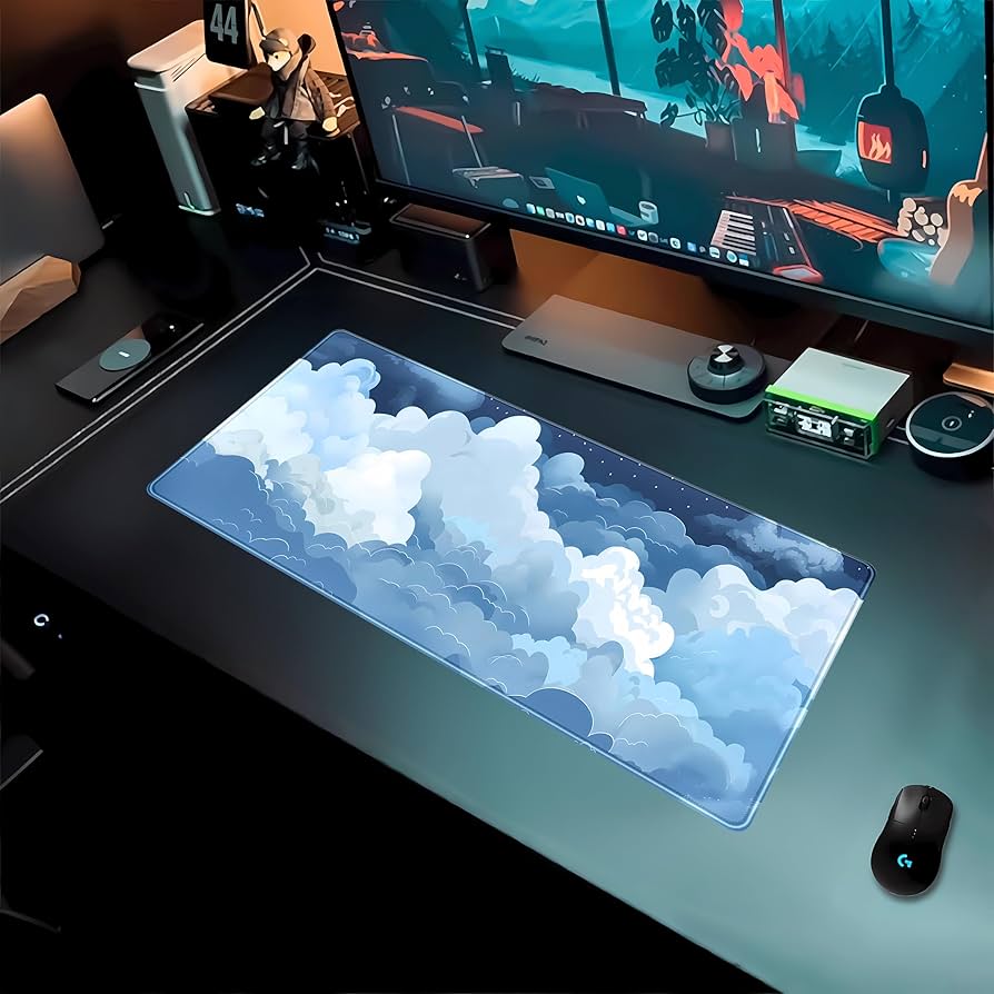 Blue and white Puffy Clouds desk mat by Problems Solved, featuring a cute gaming mouse pad with cloud design.