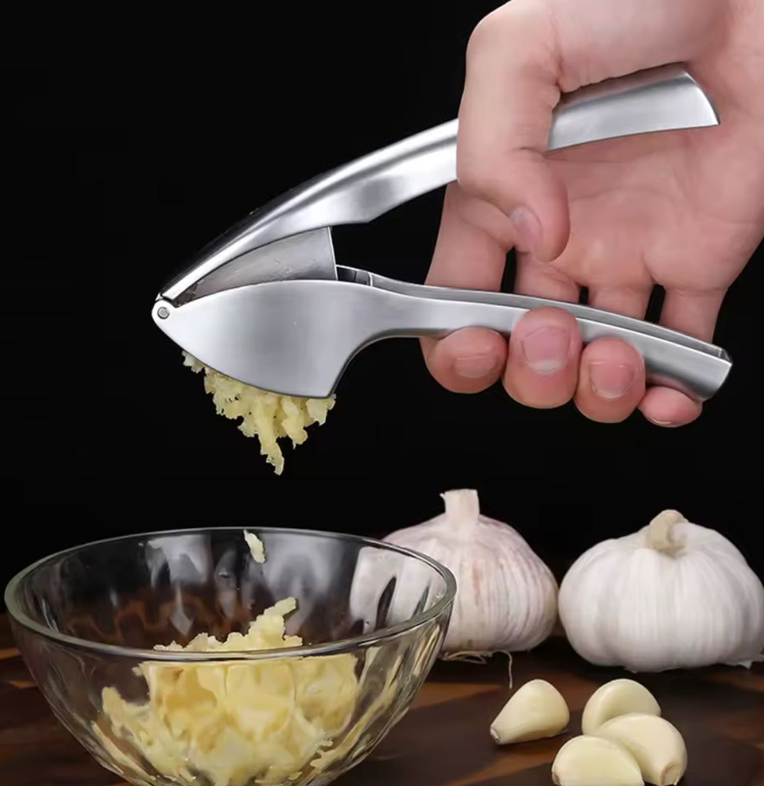 Problems Solved stainless steel garlic press and crusher, manual garlic mincer with ergonomic handle for effortless garlic crushing.