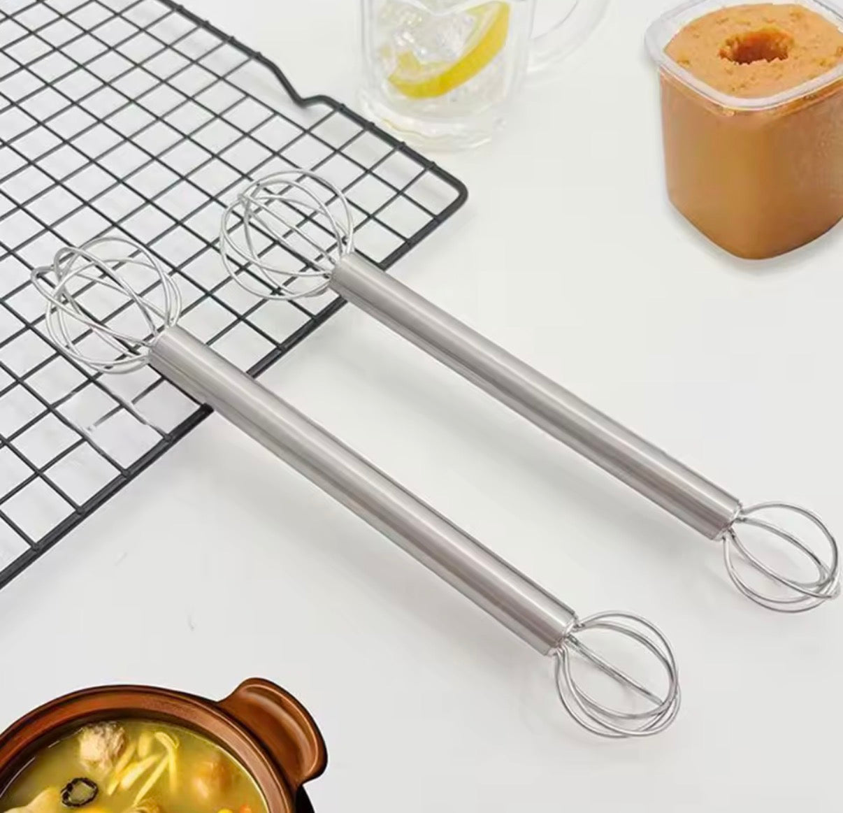 Problems Solved Measurement Muddler Miso LS1500, a stainless steel muddler with measurement markings, used for mixing cocktails.