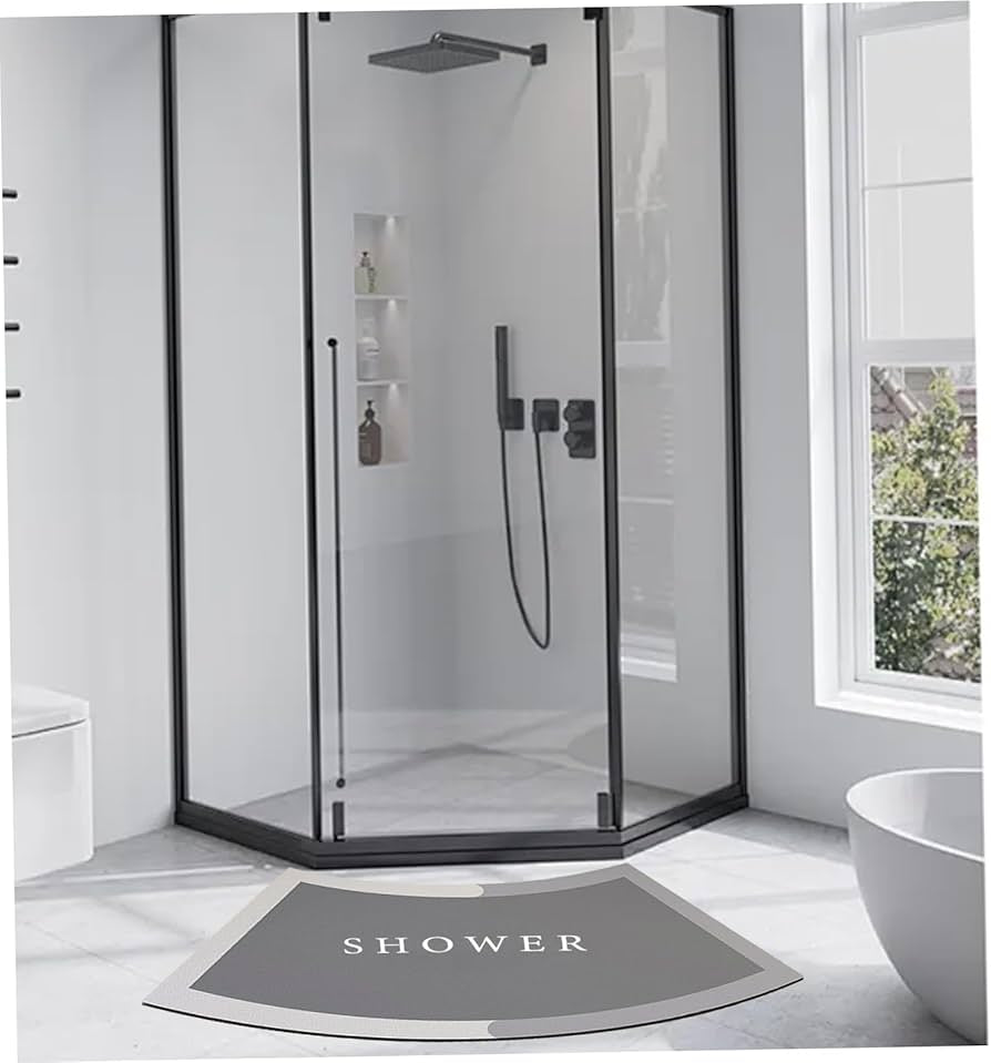 Problems Solved curved bath mat with absorbent, non-slip surface and quadrant design for safe, comfortable showering.