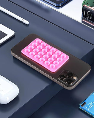 Problems Solved 3-piece silicone suction cup phone holder with double-sided design and 24 suction cups on a white background.