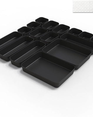 Problems Solved 16-piece drawer organiser set with clear plastic compartments for kitchen or bathroom storage.