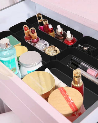 Problems Solved 16-piece drawer organiser box set with compartments for kitchen and bathroom storage.