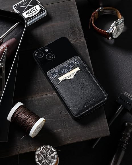 Slim leather adhesive card holder attached to a phone, designed for men and women, by Problems Solved.