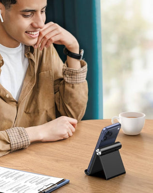 Problems Solved phone stand for desk, adjustable mobile phone holder compatible with iPhone, supporting hands-free viewing.