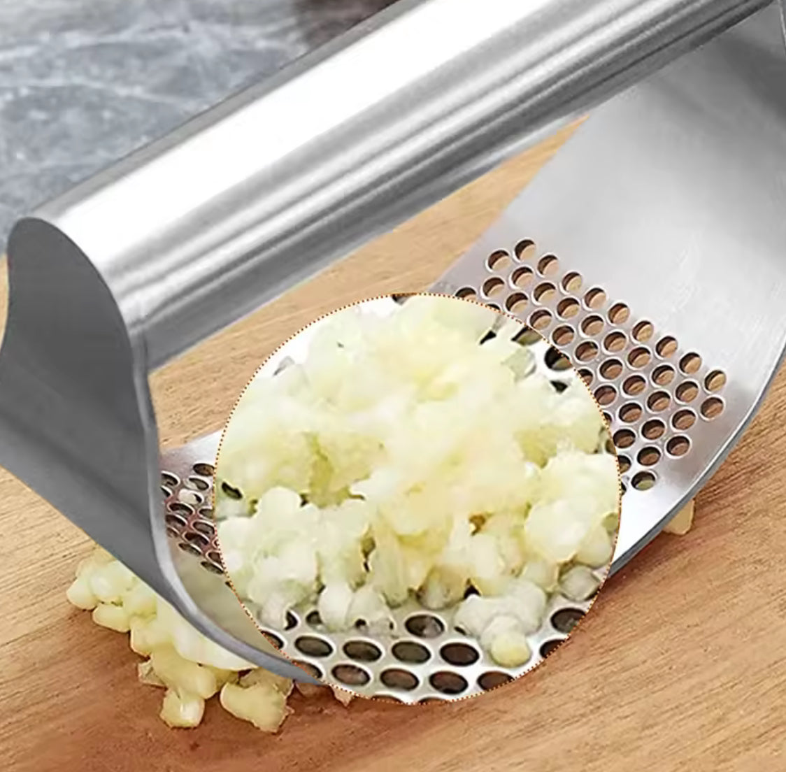 Problems Solved stainless steel garlic press squeezer, manual kitchen tool for easily crushing garlic cloves.