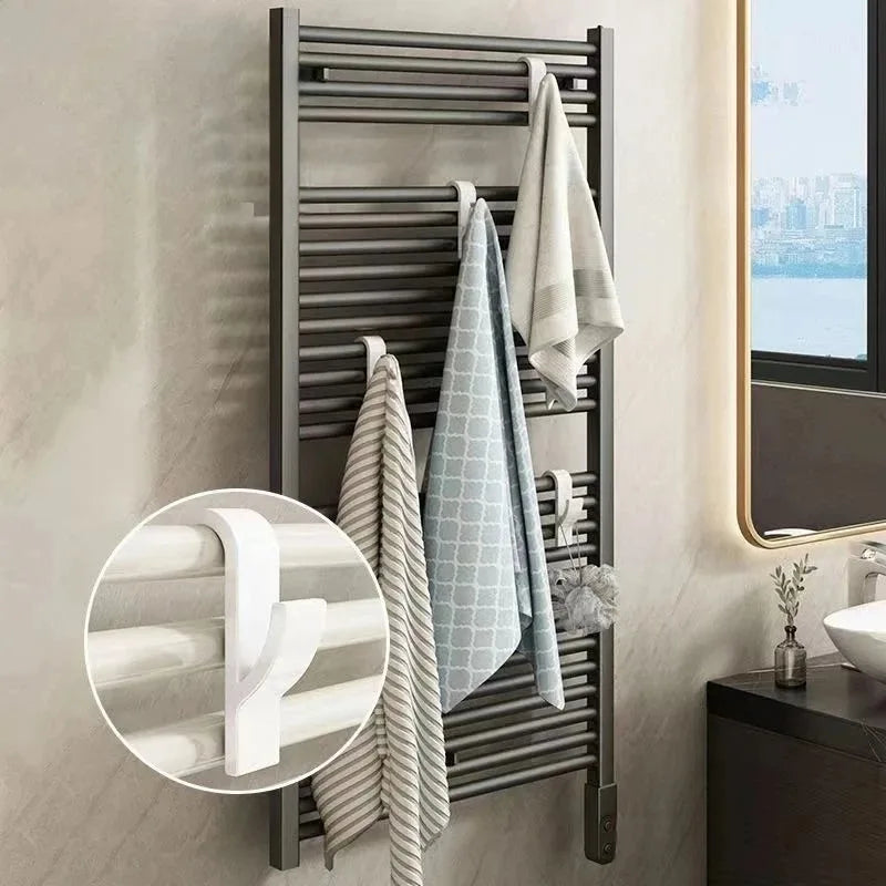 Problems Solved bathroom towel holder and heated radiator rail, wall-mounted shower towel hanger with sleek metallic finish.