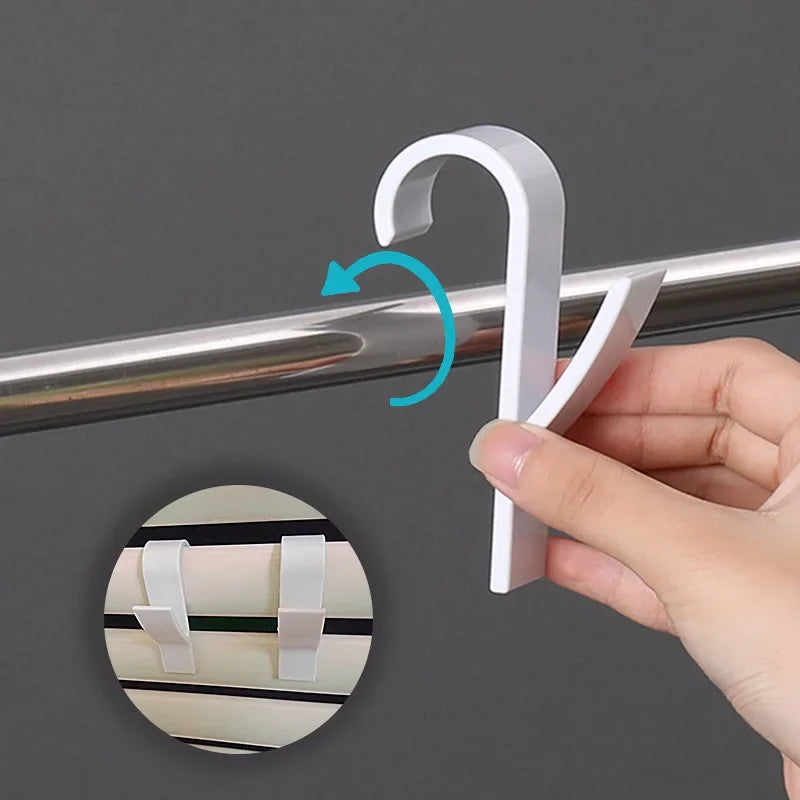 Bathroom towel holder hanger and heated radiator rail from Problems Solved, shown mounted on the wall with towels hanging.