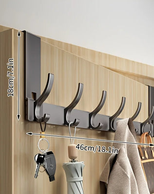 Bathroom shower storage rack by Problems Solved with space-saving aluminum design and easy installation for towels and accessories.