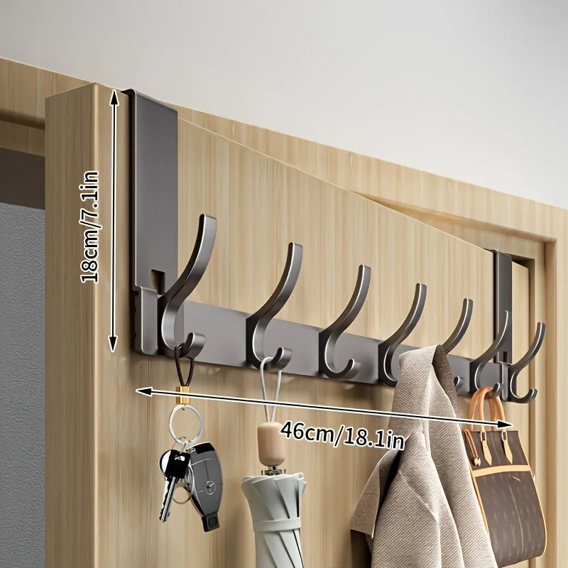 Bathroom shower storage rack by Problems Solved with space-saving aluminum design and easy installation for towels and accessories.