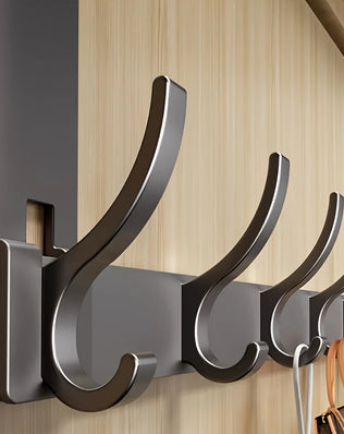 Easy-install aluminum bathroom shower storage rack with space for towels, by Problems Solved.