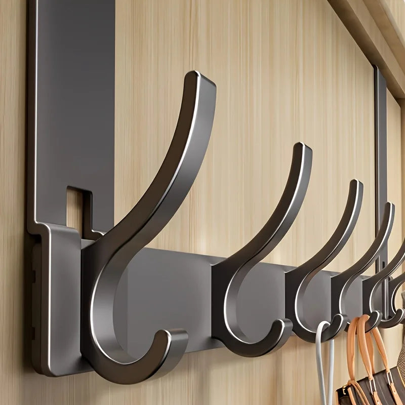 Easy-install aluminum bathroom shower storage rack with space for towels, by Problems Solved.