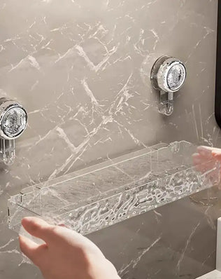 Large suction cup wall-mounted bathroom storage rack with hanging basket for shower gels and cosmetics by Problems Solved.