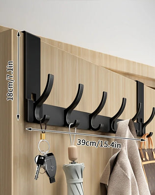 Bathroom shower storage rack with space aluminum design and towel hooks, easy to install for organized bathroom space.