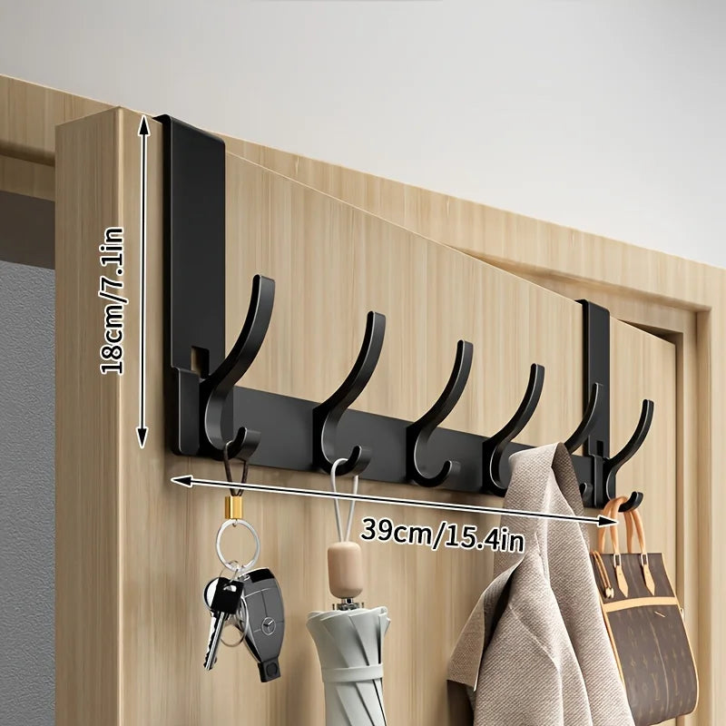 Bathroom shower storage rack with space aluminum design and towel hooks, easy to install for organized bathroom space.