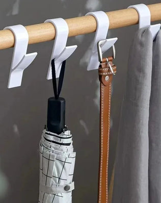 Heated bathroom towel holder and radiator rail by Problems Solved, featuring chrome finish and multiple bars for drying towels.